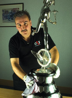 Lloyd Mister with the iconic Isle of Man TT Senior Trophy
